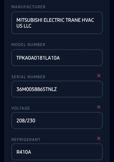 The manufacturer, model, serial, voltage and refrigerant the app filled in from that photo